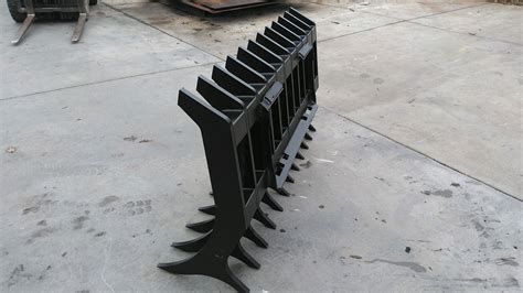 skid steer root rakes|root rake for skid loader.